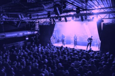 Rock band playing a concert at a live house in Europe